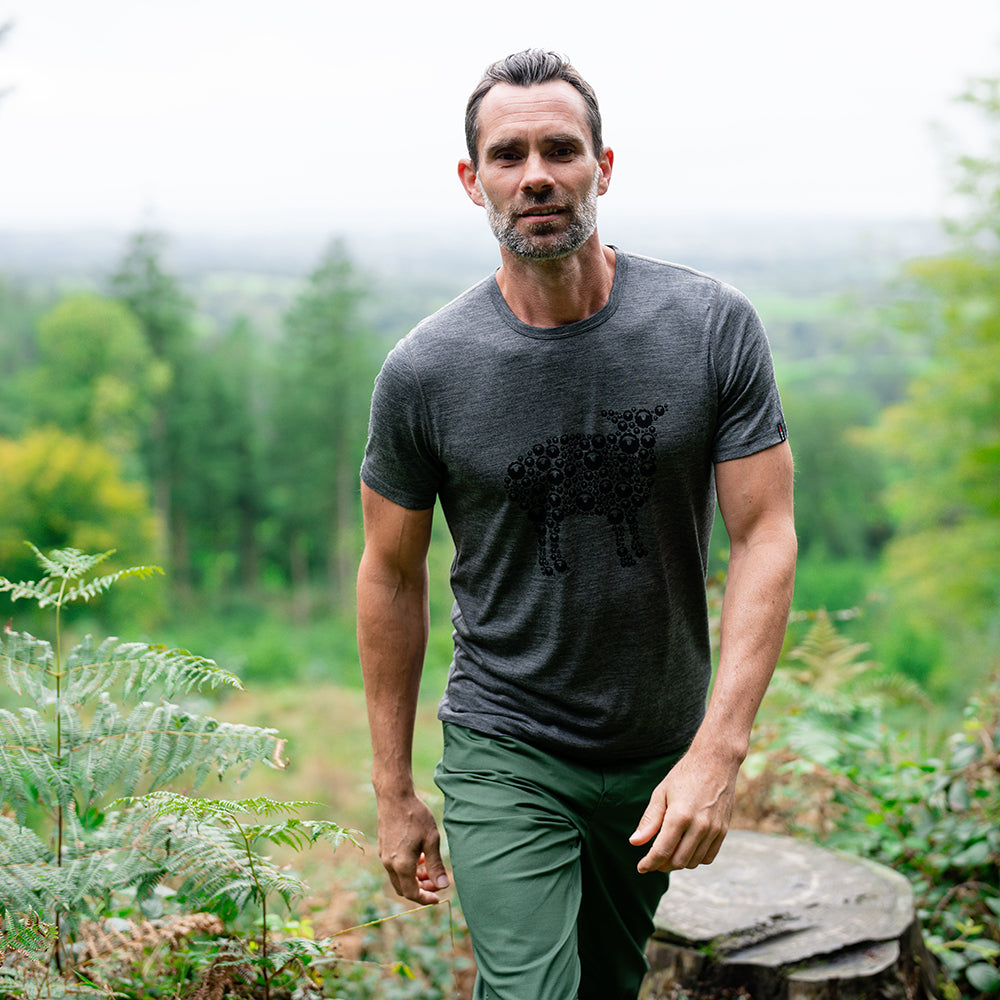 Isobaa | Mens Merino 150 Sheep Tee (Smoke/Black) | Gear up for everyday adventures in Isobaa's superfine Merino Tee. | Model: Ben