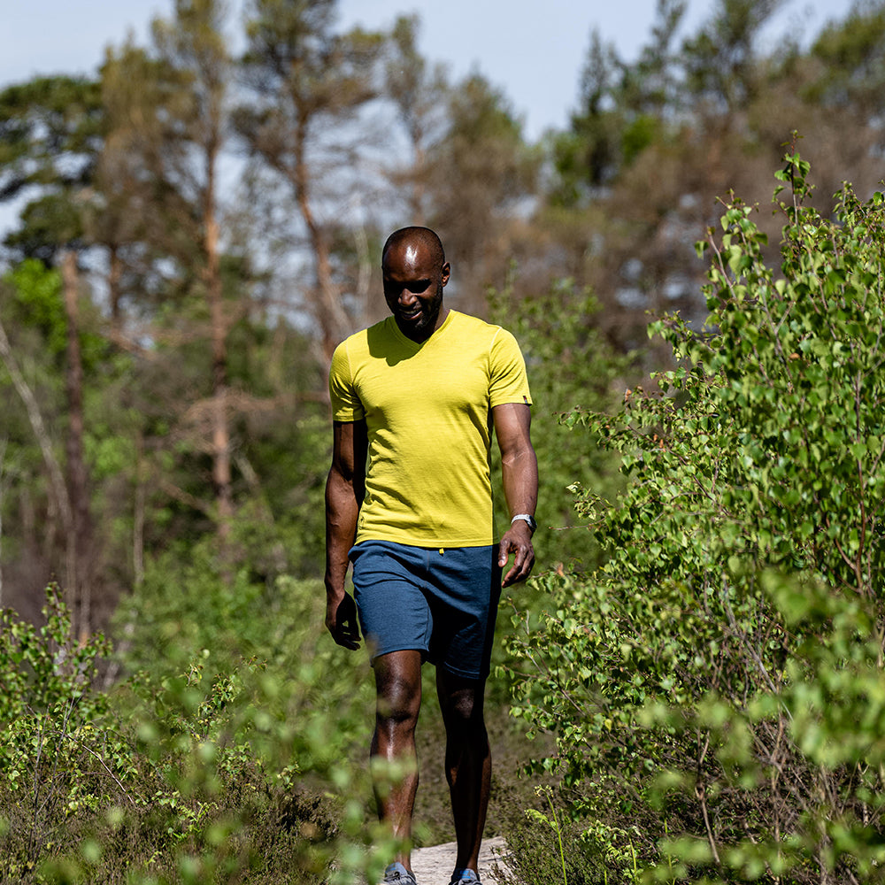 Isobaa | Mens Merino 150 V-Neck Tee (Lime) | Embark on new adventures with Isobaa's superfine Merino V-neck Tee. | Model: Michael