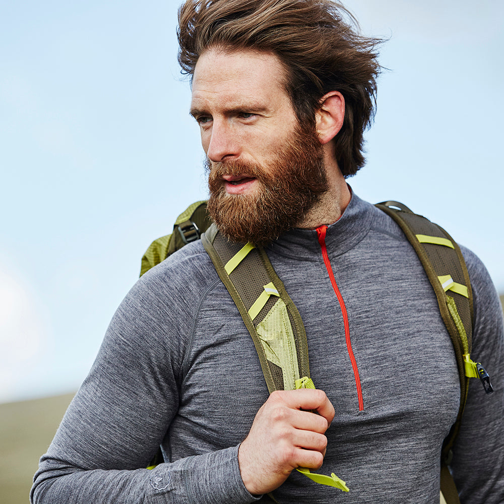 Isobaa | Mens Merino 200 Long Sleeve Zip Neck (Charcoal) | Experience the best of 200gm Merino wool with this ultimate half-zip top – your go-to for challenging hikes, chilly bike commutes, post-workout layering, and unpredictable weather. | Model: Craig