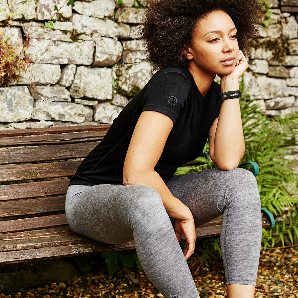 Isobaa | Womens Merino 200 Tights (Charcoal) | Conquer mountains, ski slopes, and sofa days with unmatched comfort in our 200gm Merino wool tights. | Model: Savanah