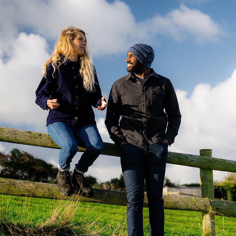 Isobaa | Womens Merino Blend Mountain Shirt (Navy) | Conquer trails, peaks, and urban adventures with this high-performance Merino blend overshirt. | Model: Amy