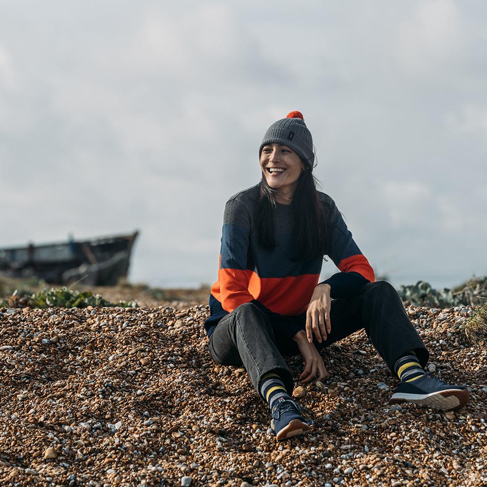 Isobaa | Womens Merino Block Stripe Sweater (Smoke/Denim/Orange/Navy) | Discover effortless style and exceptional comfort with our extrafine 9-gauge Merino wool crew neck sweater. | Model: Jessica