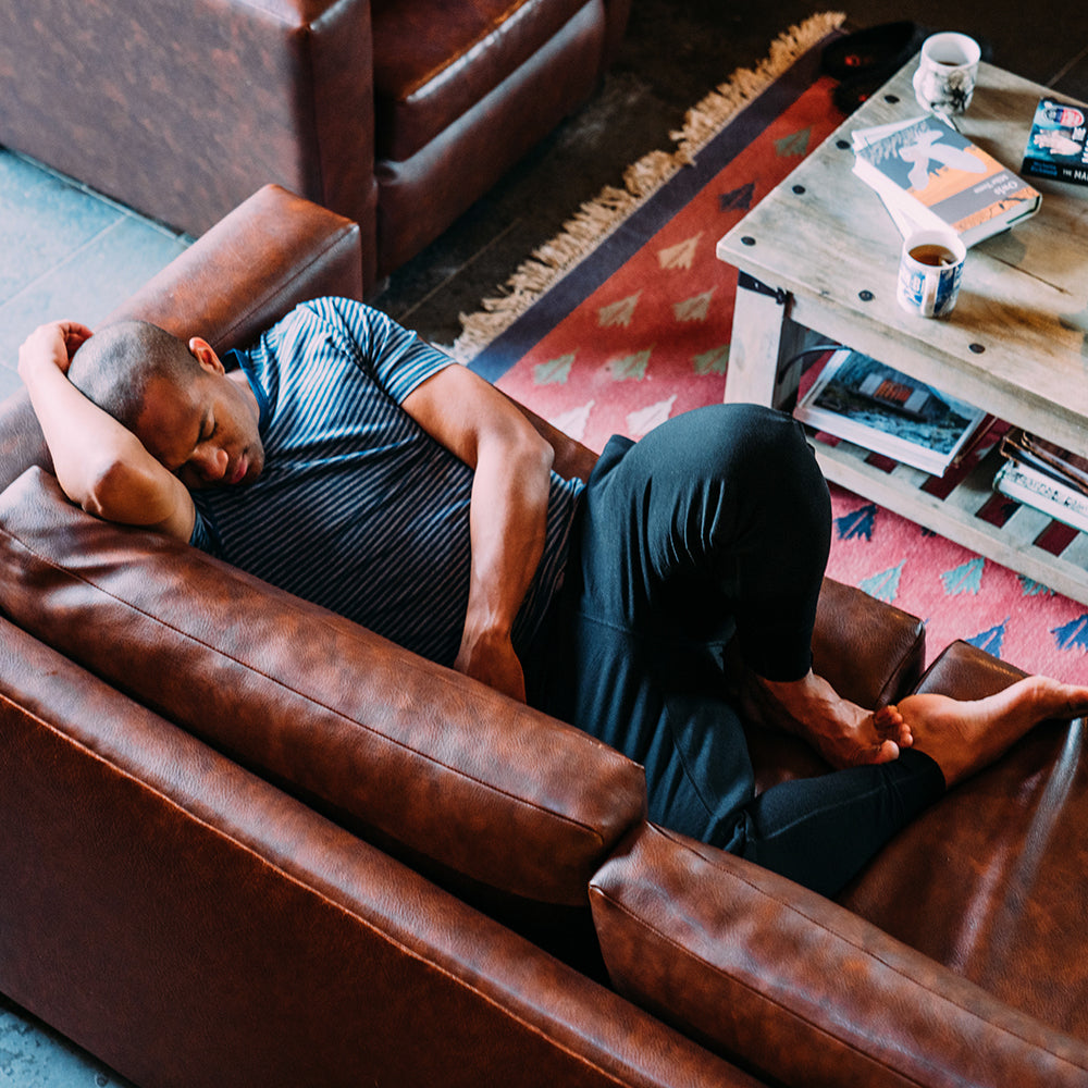 Isobaa | Mens Merino 260 Lounge Cuffed Joggers (Black/Smoke) | Discover unparalleled comfort and versatility with our luxurious 260gm Merino wool lounge joggers. | Model: Edirin