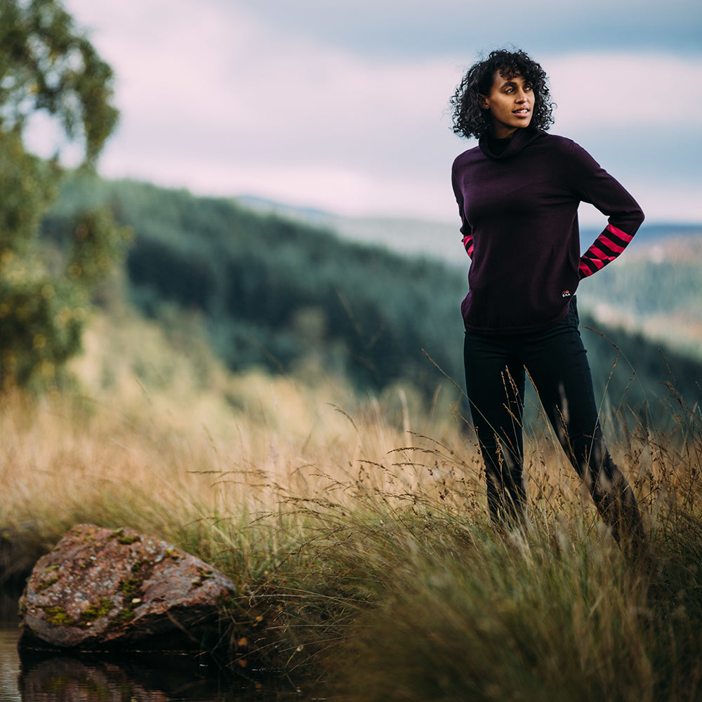 Isobaa | Womens Merino Roll Neck Sweater (Wine/Fuchsia) | Discover premium style and performance with Isobaa's extra-fine Merino roll neck sweater. | Model: Micah