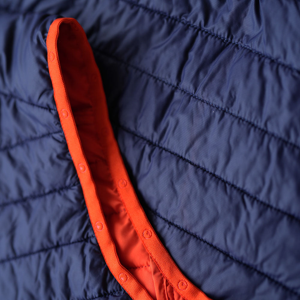 Isobaa | Womens Merino Wool Insulated Gilet (Navy/Orange) | Fight the chill with our innovative Merino gilet.