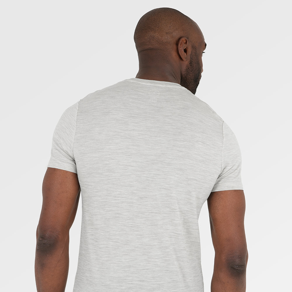 Mens Merino 150 Sketched Sunset Tee (Jute/Denim) | Model: Michael