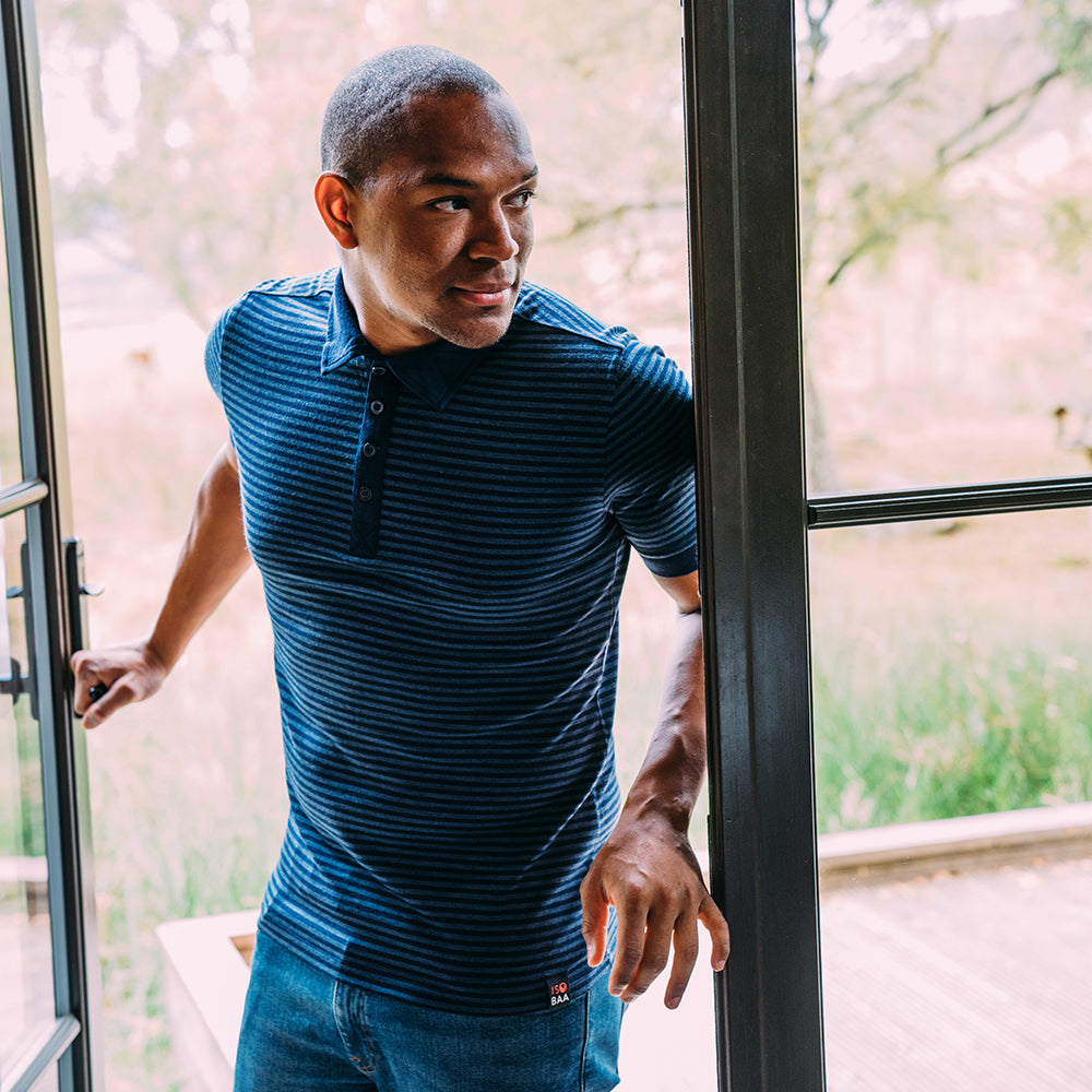 Isobaa | Mens Merino 180 Short Sleeve Polo Shirt (Stripe Navy/Denim) | The ultimate Merino wool polo  – perfect for weekend hikes, bike commutes, post-adventure coffee stops, office days, and everything in-between. | Model: Edirin