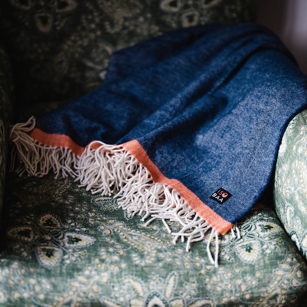 Isobaa | Merino Herringbone Throw (Navy/Orange Stripe) | Wrap yourself in pure comfort with Isobaa's super-soft Merino throw.