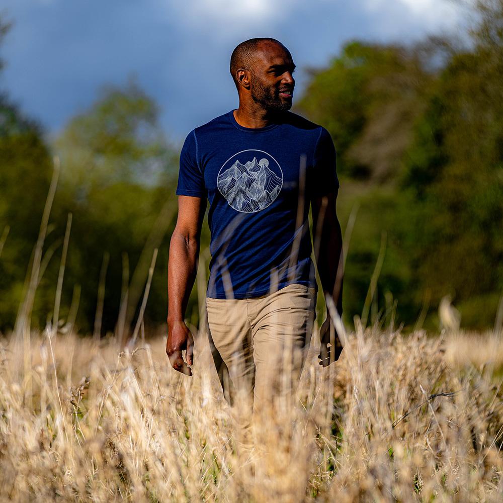 Isobaa | Mens Merino 150 Mountains Tee (Navy) | Gear up for adventure with our superfine Merino Tee. | Model: Michael