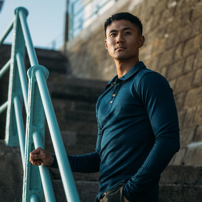 Isobaa | Mens Merino 200 Long Sleeve Polo Shirt (Petrol/Lime) | Discover unmatched comfort with our 200gm Merino wool polo. | Model: Donald