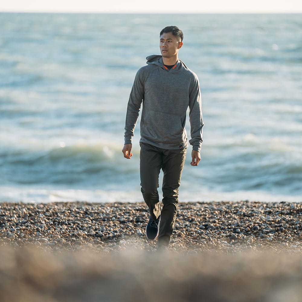 Isobaa | Mens Merino 260 Lounge Hoodie (Charcoal/Orange) | Experience the best in comfort and performance with our midweight 260gm Merino wool pullover hoodie. | Model: Donald