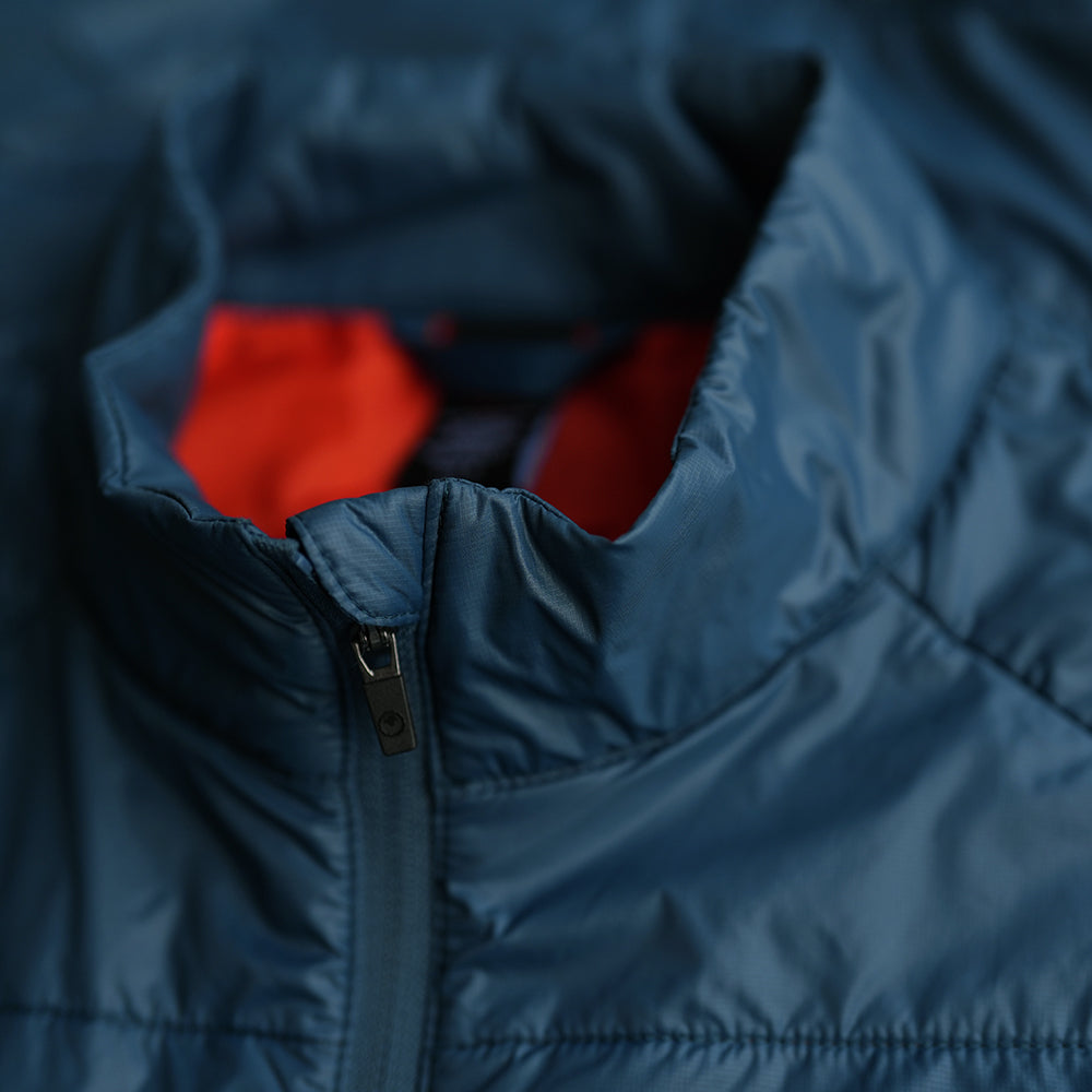 Isobaa | Mens Packable Insulated Jacket (Petrol/Orange) | Exceptional warmth, packable convenience, and sustainable design with our lightweight Merino wool jacket.