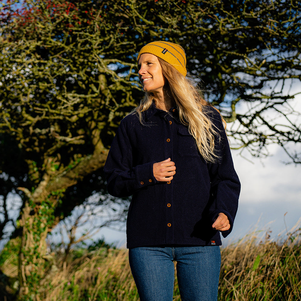 Isobaa | Womens Merino Blend Mountain Shirt (Navy) | Conquer trails, peaks, and urban adventures with this high-performance Merino blend overshirt. | Model: Amy
