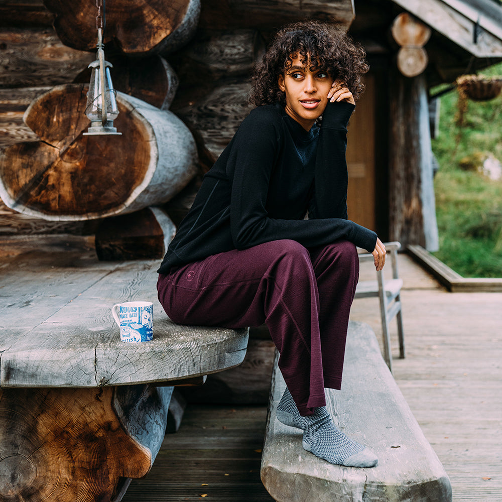 Isobaa | Womens Merino 260 Lounge Sweatshirt (Black) | The ultimate 260gm Merino wool sweatshirt – Your go-to for staying cosy after chilly runs, conquering weekends in style, or whenever you crave warmth without bulk. | Model: Micah